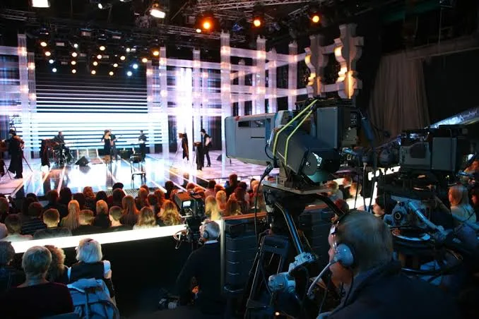 A live music performance on a lit stage