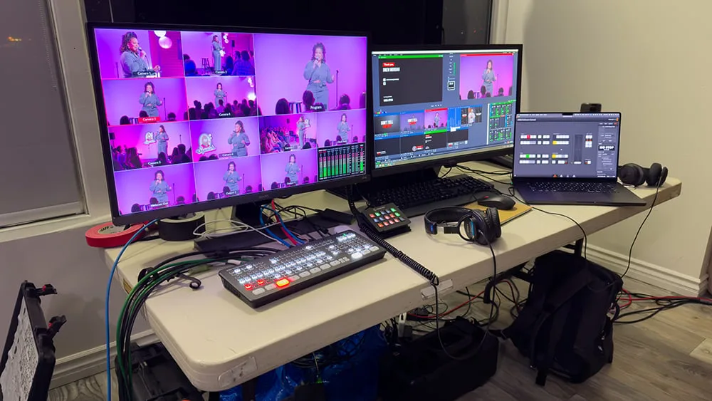 A production desk with cameras and capture hardware