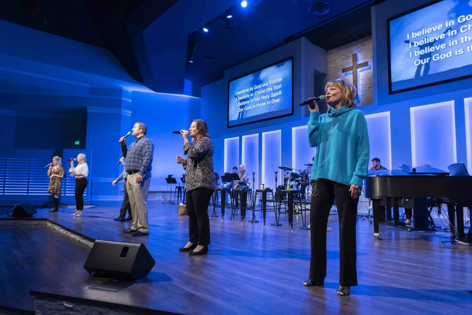 A worship team singing live